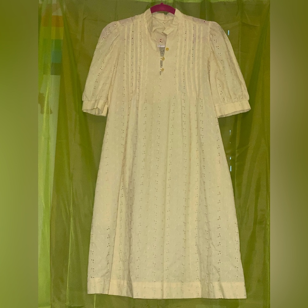 Vintage sheer dress with cut outs. Soft yellow color